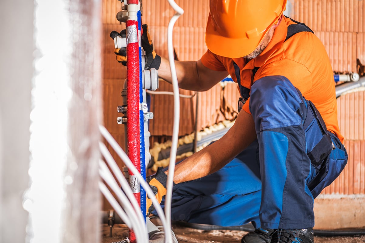 Plumber Installing Water Supply 